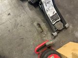 many different types of tools on the floor next to each other