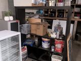 a refrigerator and a freezer in a garage