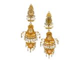 an image of a pair of earrings with gold and pink stones