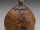 an image of a wooden object with a bird on top