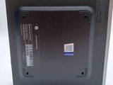 a black box with a sticker on it on a white surface