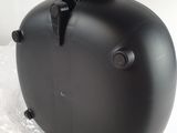 an image of a black motorcycle helmet on a plastic bag
