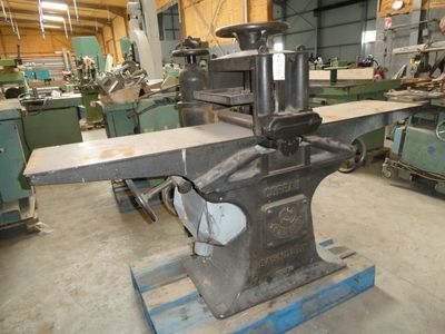 a machine that is sitting in a room with many other machines