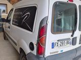 a white van that is parked in a garage