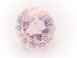 a close up of a pink diamond on a white background