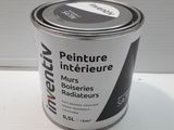 an image of a can of paint sitting on a table