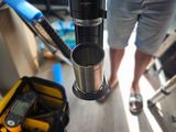 a person standing on a boat holding a camera