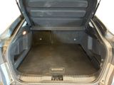 a trunk of a car with the back door open