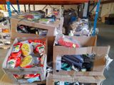 several boxes of assorted items are stacked on a pallet in a warehouse