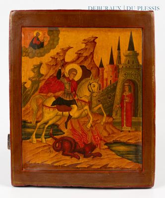 an old wooden box with a painting of a man on a horse in front of a castle