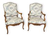 pair of louis xv style armchairs with upholstered upholstered arms