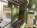 an image of a machine that is working on a piece of wood
