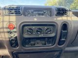 a dashboard of a car with a clock on it