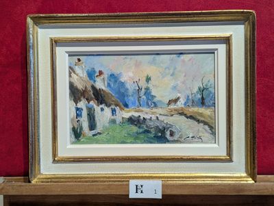 une image représentant un tableau posé sur une étagère dans une pièce