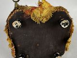 a small piece of cloth with buttons on it