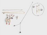 a collection of jewellery including a necklace, bracelet and earrings