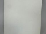 a close up of a piece of paper on a table