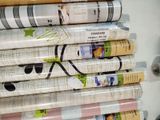 a stack of newspapers stacked on top of each other
