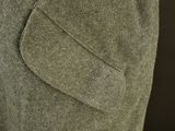 a close up of a man ' s jacket and tie