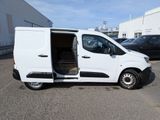 the white van is parked in the parking lot with its doors open