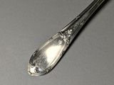 a spoon that is sitting on a table