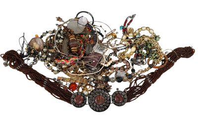 a picture of a bunch of jewelry on a white background