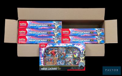 a lot of pokemon cards in a cardboard box