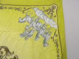 a yellow scarf with a picture of a train on it