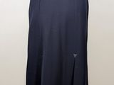 a black skirt with a slit on the side and a black top