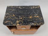 an image of a marble top table with a drawer underneath it
