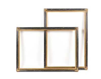 two black and gold picture frames against a white background