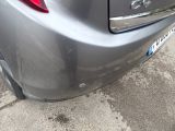 a close up of a car ' s rear bumper