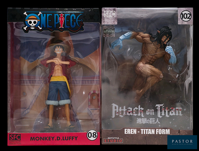 Ce sont deux figurines : l'une représente un singe et l'autre un pirate.