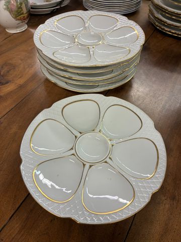 6 assiettes à huitres en porcelaine de Limoges Raynaud.