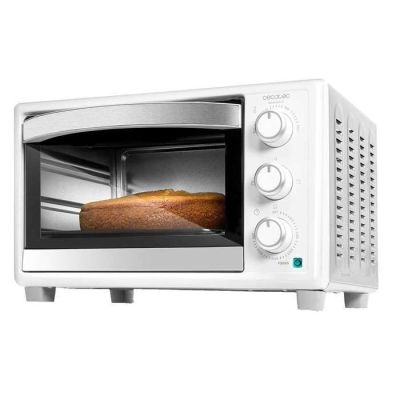 une photo d'un four grille-pain contenant une miche de pain