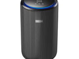 une image représentant un purificateur d'air noir sur fond blanc
