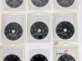 six different types of circular blades are shown in a display case