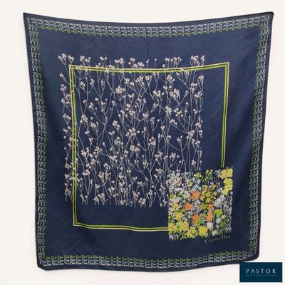 an image of a blue scarf with a floral design
