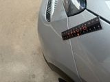 a sticker on the side of a car that says patto