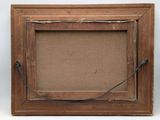 an old picture frame with a rope hanging from it ' s side
