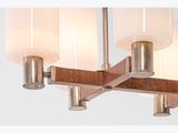 three light chandelier with glass shades in a modern style