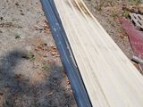 a pile of wood that is laying on the ground