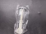 a plastic bag with a toothbrush in it on a table