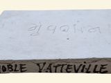 cement block with writing on top of it that says, ' endle vateville '
