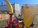 an image of a red and yellow machine with a yellow blade