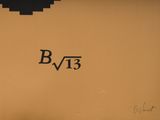 a close up of a sign on the side of a building that says b / 13
