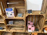 many wooden crates stacked on top of each other