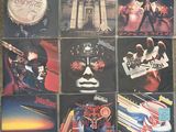 the album covers of the albums are arranged on the floor