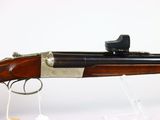 a close up of a rifle on a stand with a white background