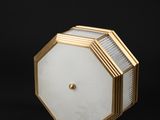 a close up of a light fixture on a black background
